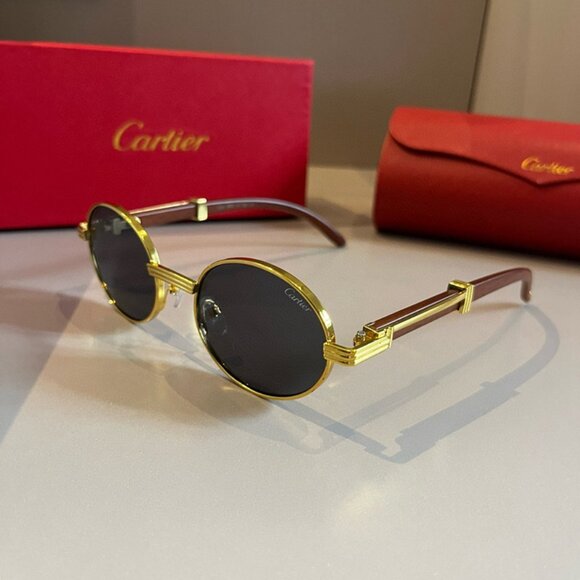 Cartier Black and Gold Oval Sunglasses - Picture 1 of 7